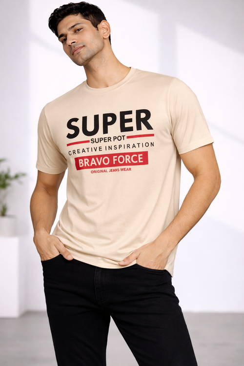 Man wearing the Amaurya Fashion beige Super Bravo Force graphic T-shirt with black jeans
